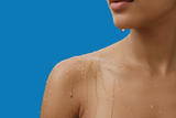 Banner image with water drops on Latina woman's shoulder